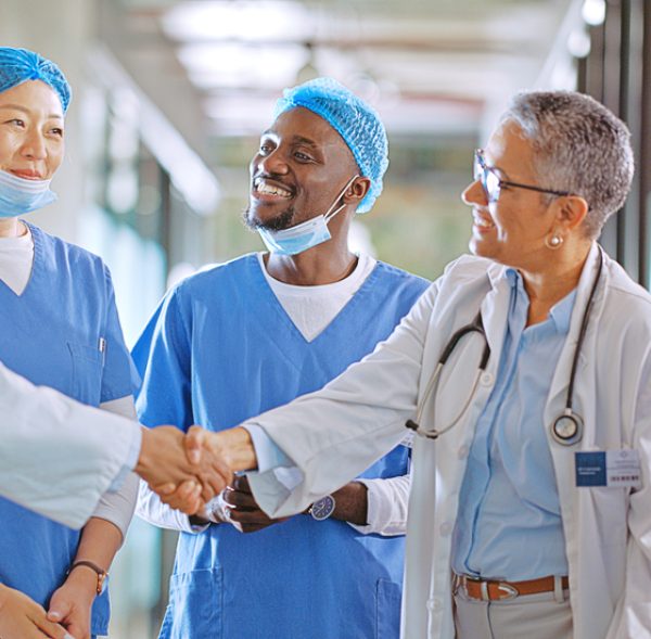 Healthcare-professionalshaking-hands-William-Russell
